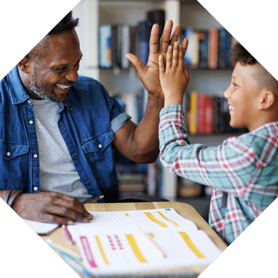 Father helping son with homework